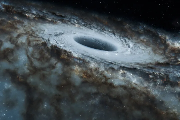 Due buchi neri che si fondono generando onde gravitazionali